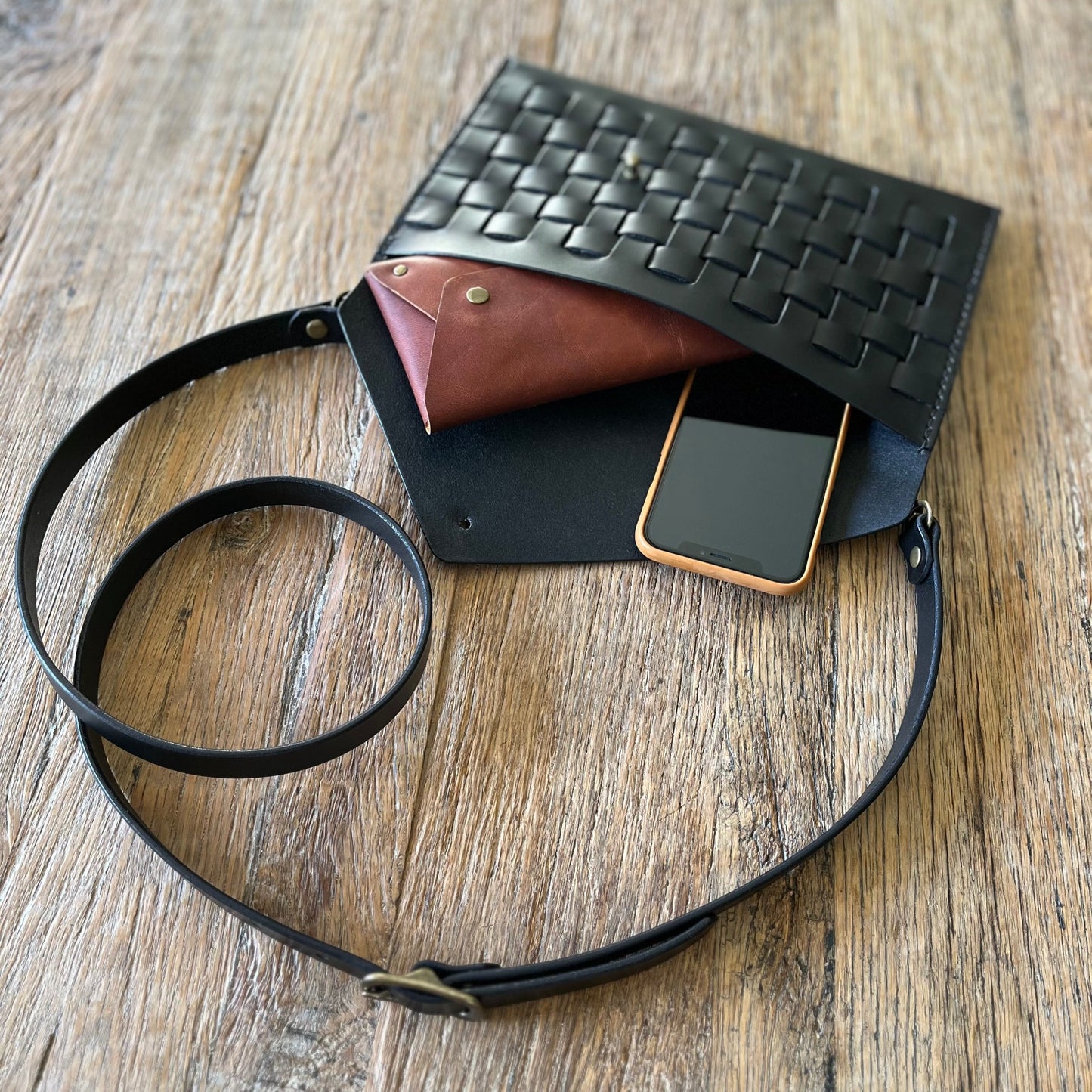 Black woven multi-wear clutch - Full grain veg-tanned leather
