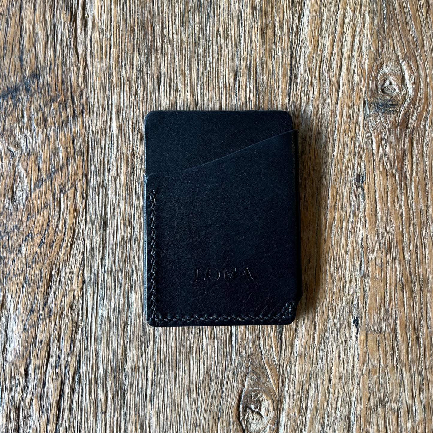 Leather wrap card wallet in black back view
